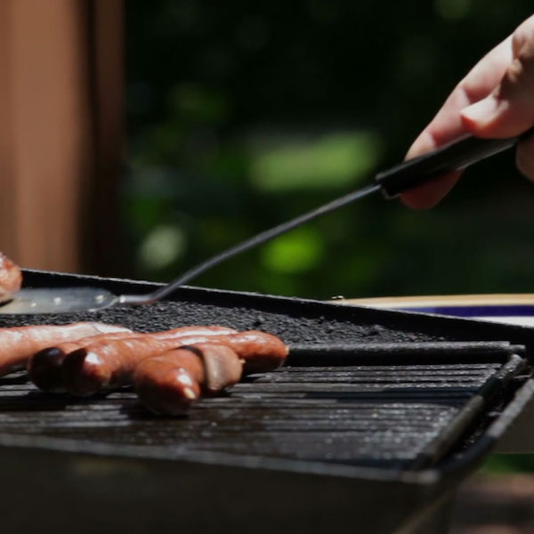 Cook on a grill this summer to keep your home cool.